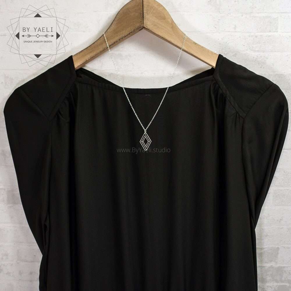 Geometric necklace silver Escher style infinity necklace