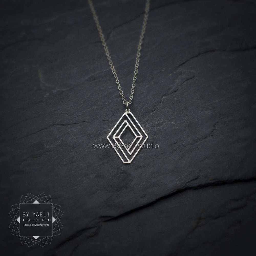 Geometric necklace silver Escher style infinity necklace