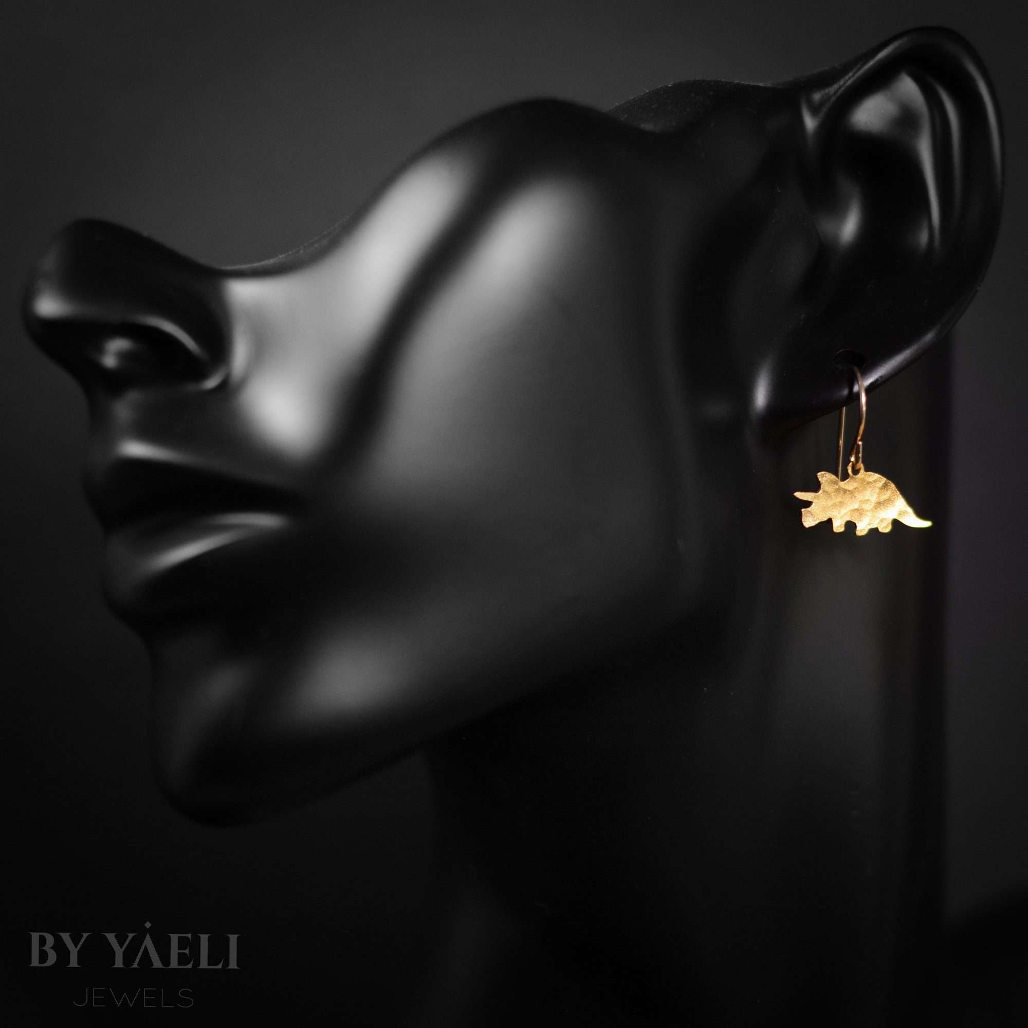 Triceratops earrings, gold dinosaur dangle earrings