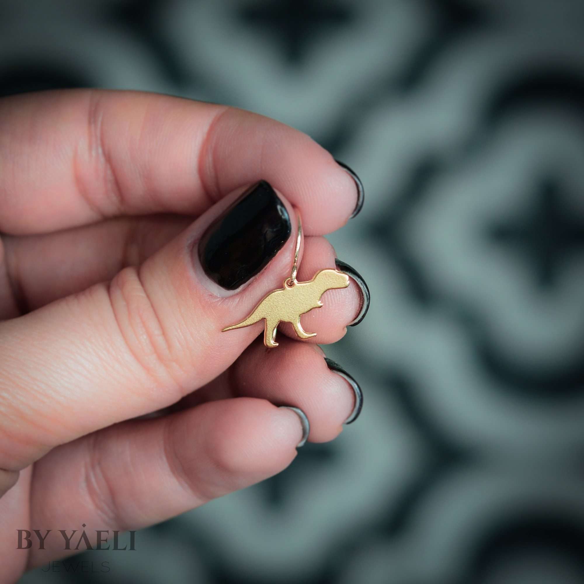 T-rex earrings, gold dinosaur dangle earrings