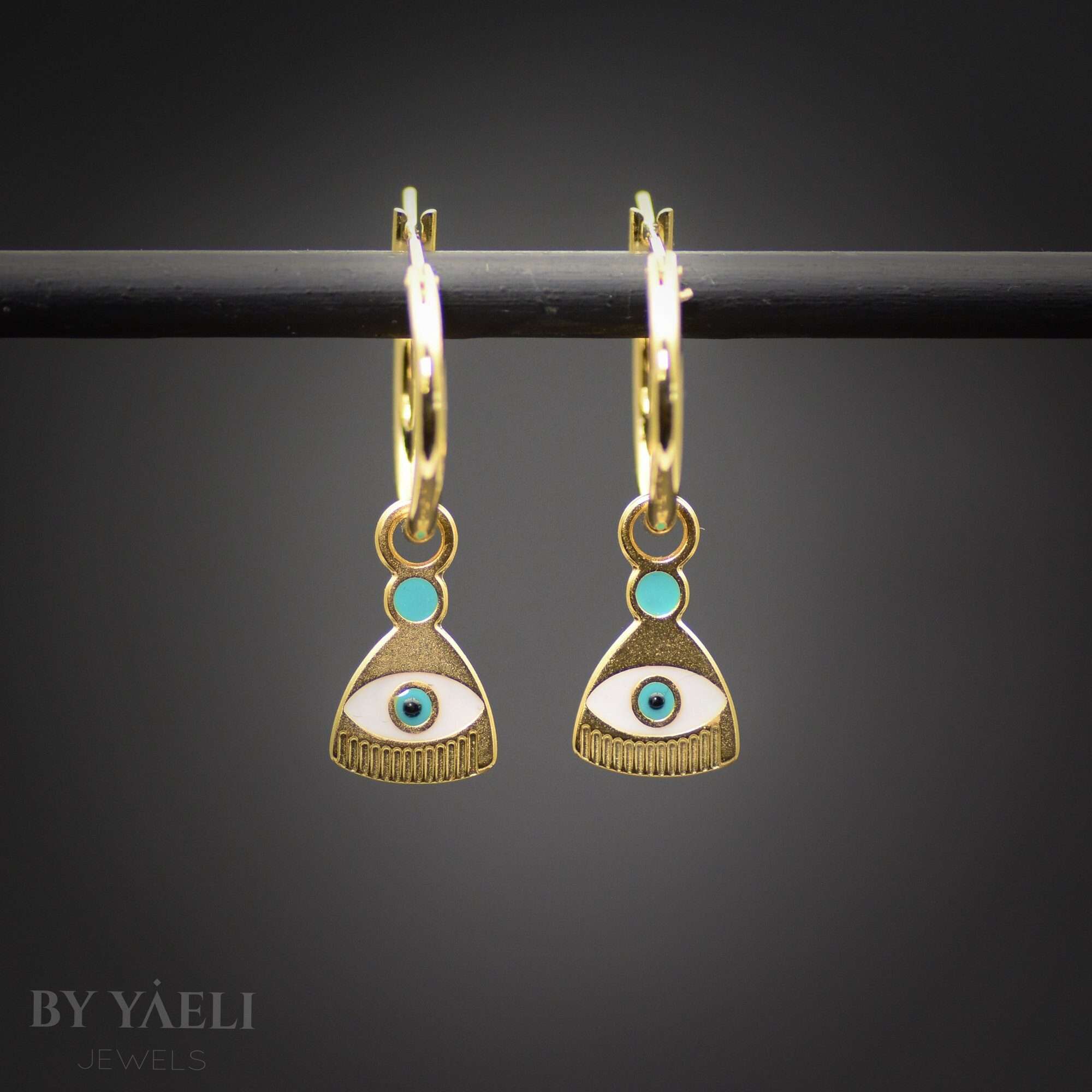 Evil eye gold hoops earrings adorned with resin, protection jewelry