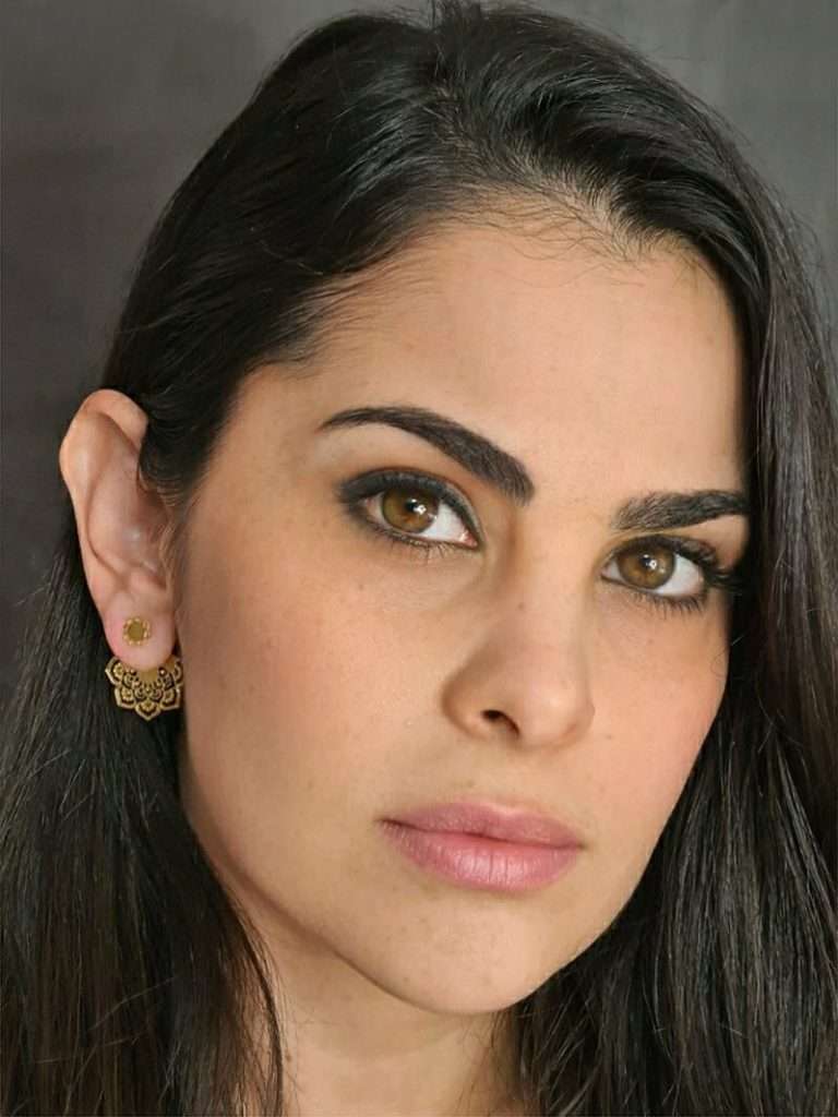 About the studio 2 Gold earrings, ornate design.